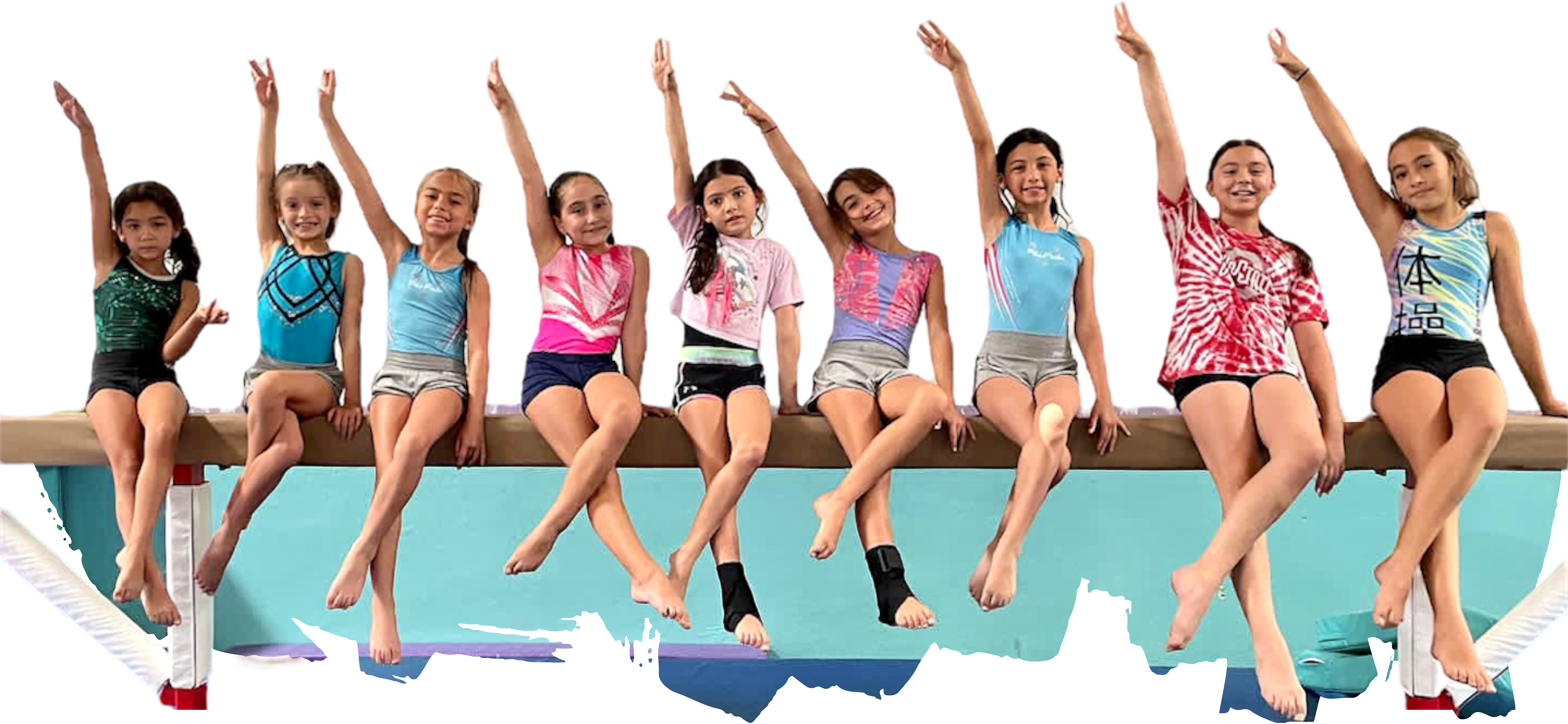 Grupo de niñas del equipo Élite en viga de equilibrio